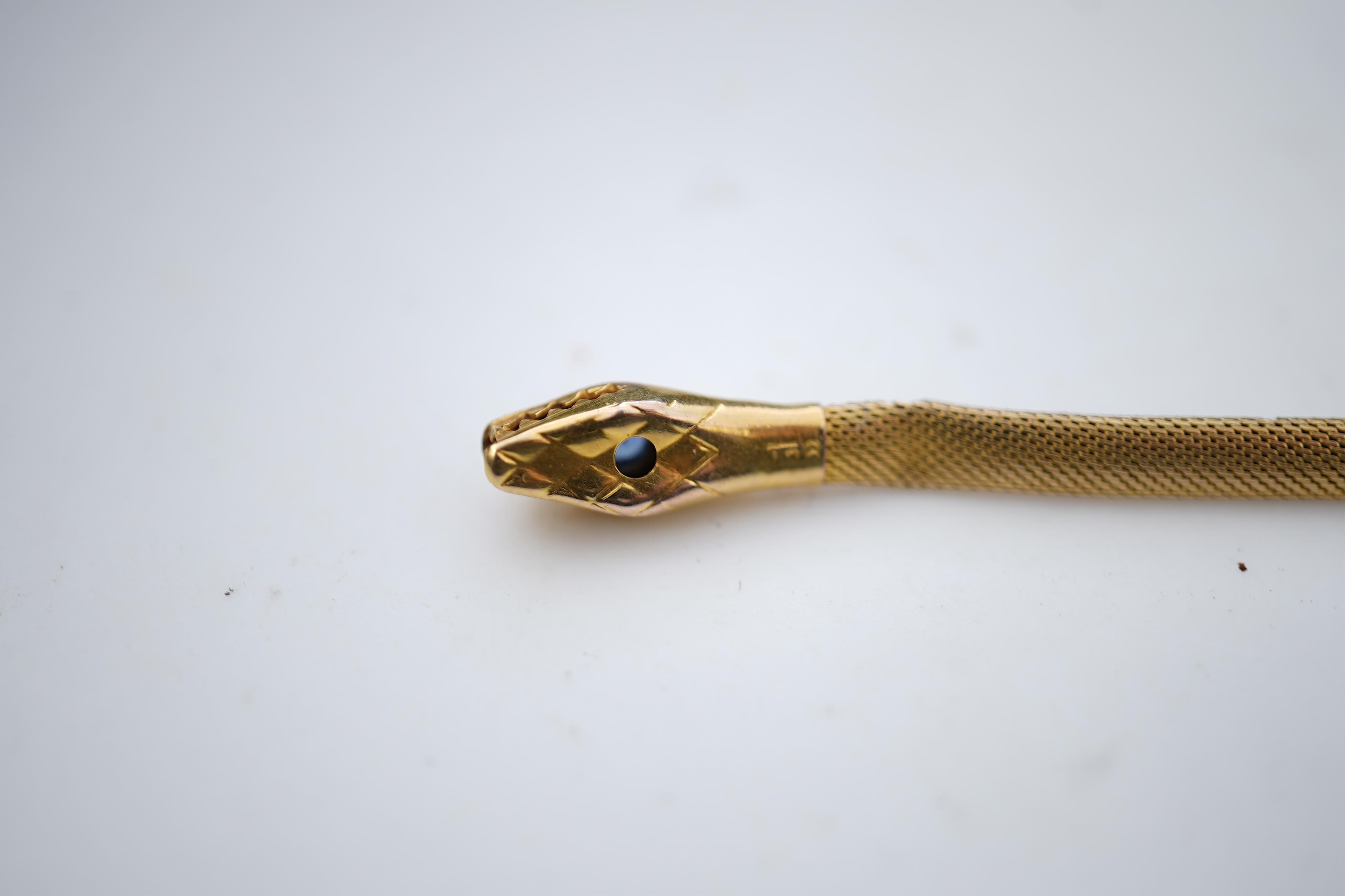 A Victorian gold, ruby and sapphire bracelet, mid 19th century